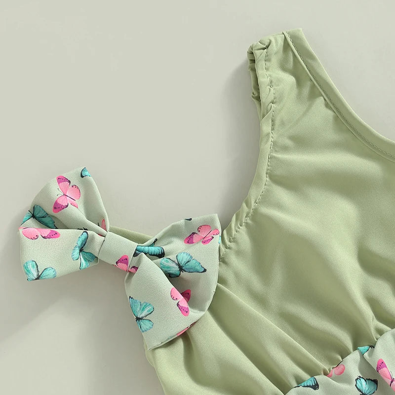 The sleeveless romper with hairband for girls, featuring a bunny and flower print, for babies aged 0 to 18 months