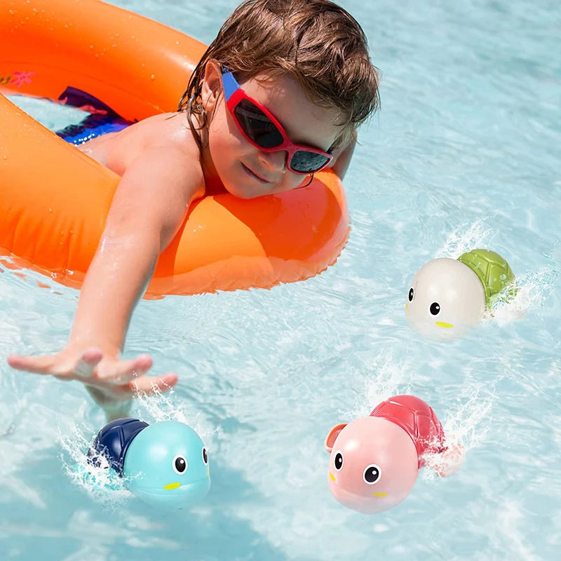 Aquatic Adventure baby bath toy set with swimming turtle and whale on the beach